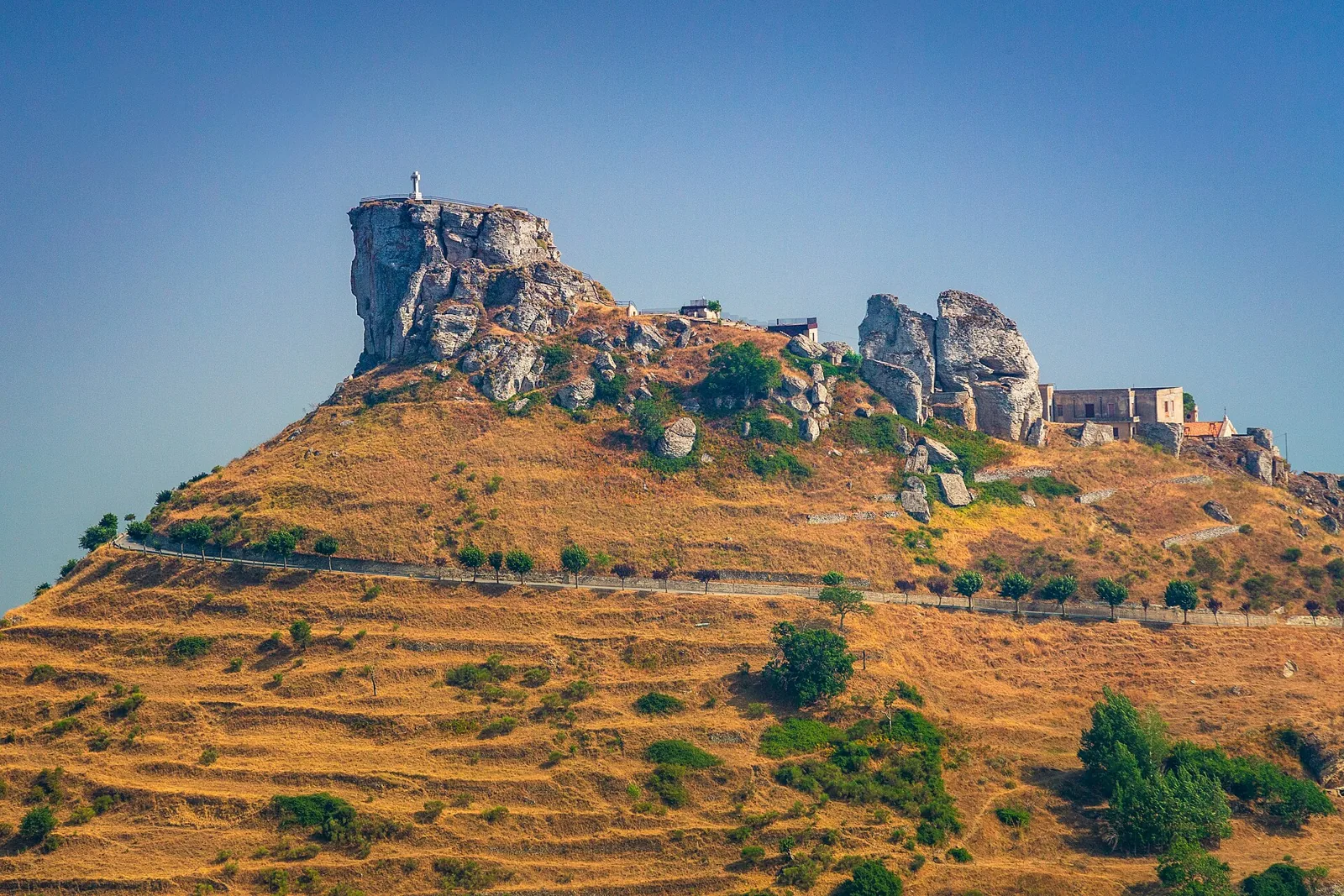Castle rock of Bova above the dry Aspromonte slope.