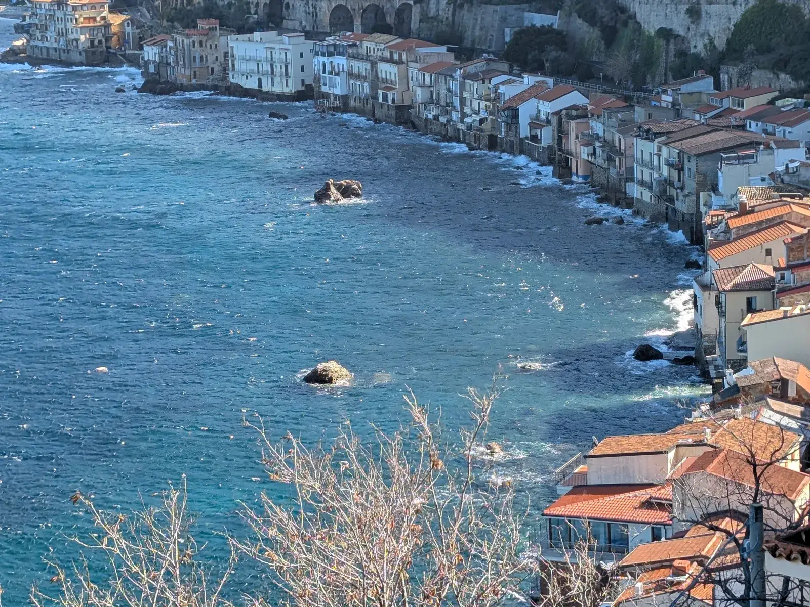 The houses of Chianalea standing right on the water in Scilla